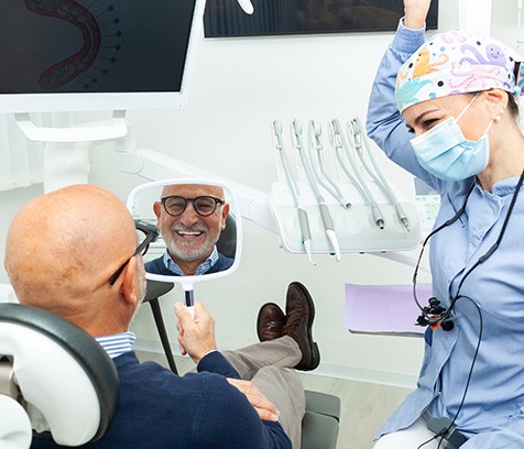 a patient and dentist talking