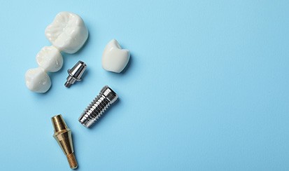 an assortment of dental implant parts