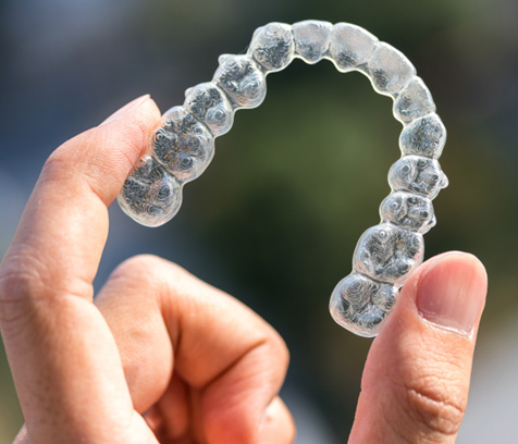 a close-up of an Invisalign aligner