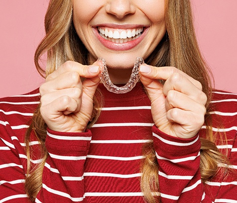 a patient with Invisalign smiling 
